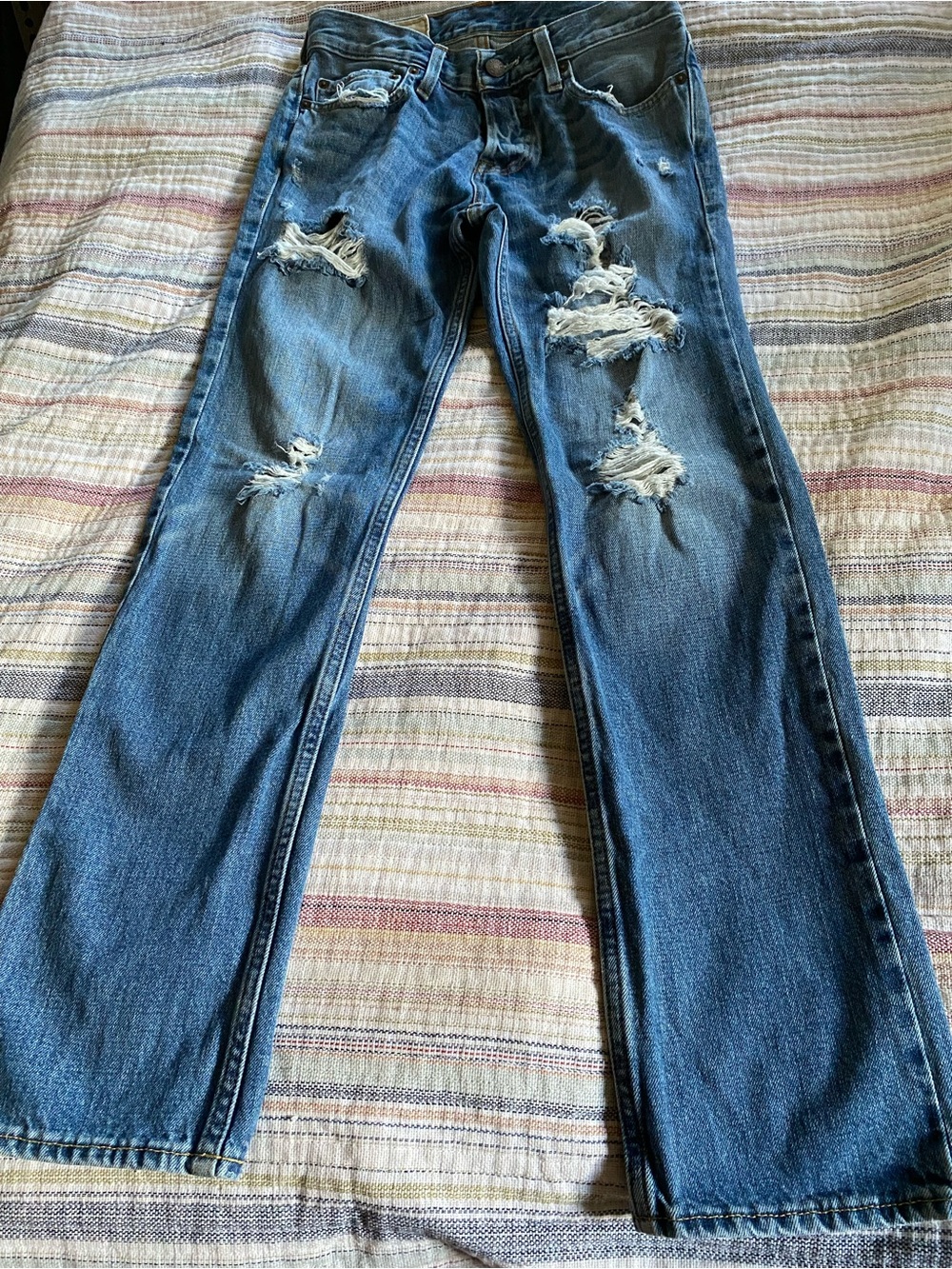 Distressed Blue Denim Jeans